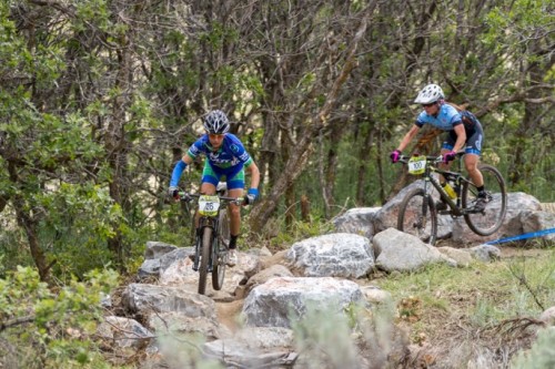 Jen Hanks leads Erika Powers through the rocks on the A-line. Photo by Angie Harker