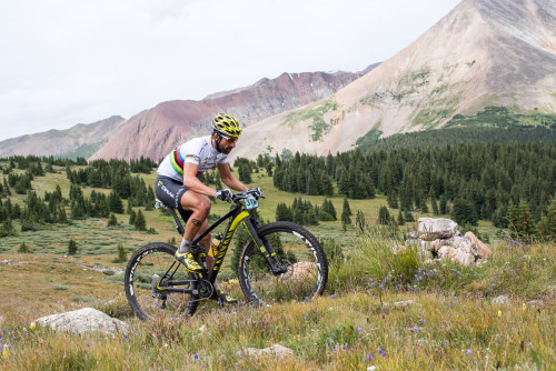 Marathon World Champion Alban Lakata crests the days biggest climb. Photo by Eddie Clark