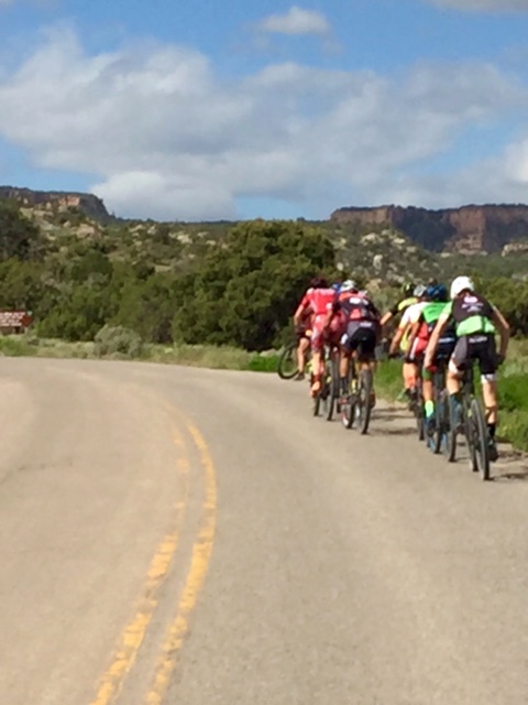 The chase group does it's best to catch a solo Todd Wells (Scott/SRAM). Photo by Shannon Boffeli