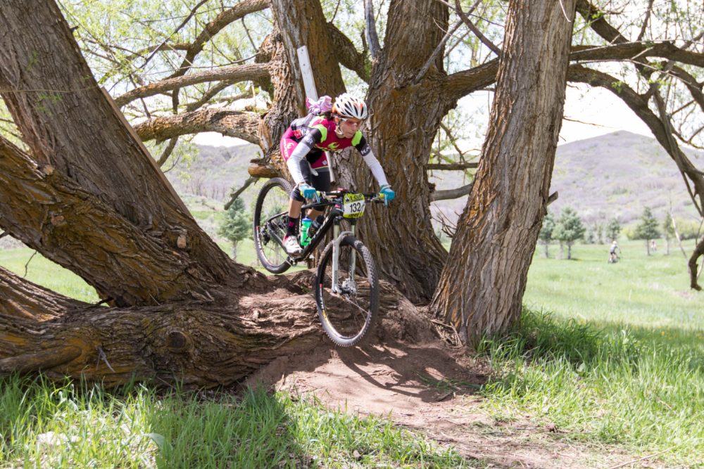 Jen Hanks gets focused on the log crossing at Soldier Hollow. Photo by: Angie Harker/Selective Vision
