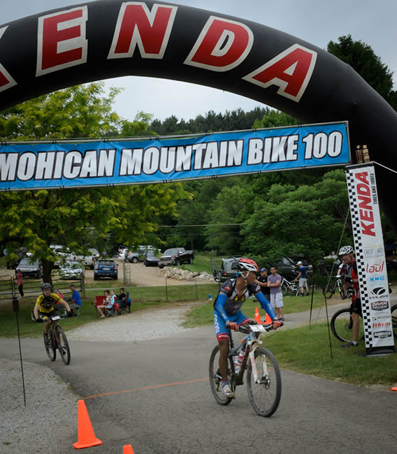 Gaps were exceptionally tight at the 2016 Mohican 100. Here Federico Ramarez crosses the line just seconds in front of Christian Tanguy. Photo by: Butch Phillips Photography