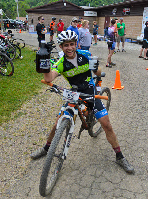 Gregory Jancaitis celebrates his new growler and an 11th-place finish. Photo by: Butch Phillips Photography