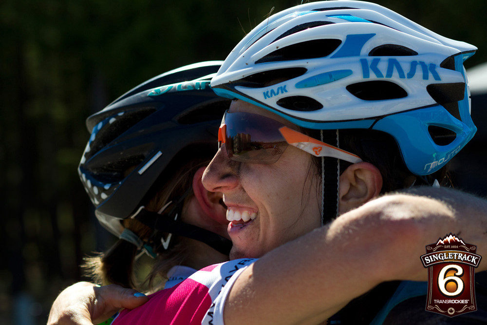 Sonya Looney sharing a hug at the finish line.