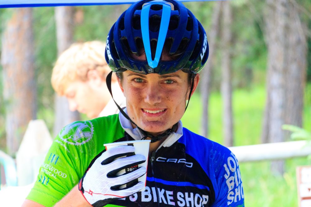 100-mile winner Carla Williams cools off at the feed zone. Photo by John Bush