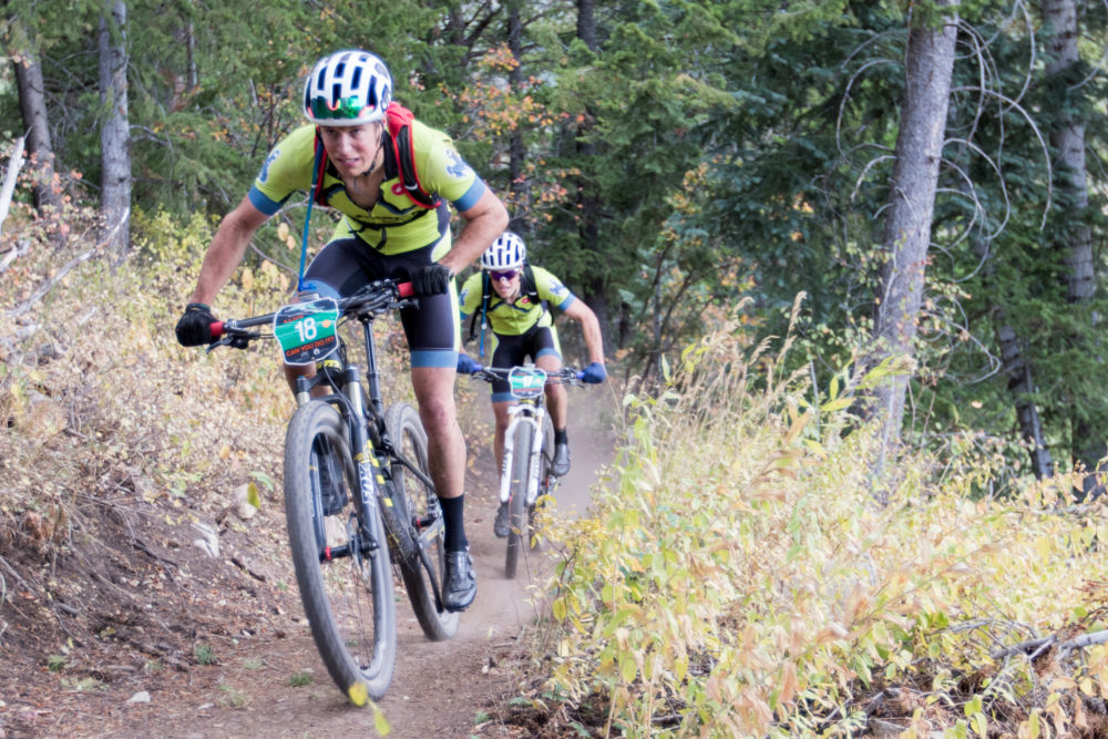 The Flynn Twins charging to the finish. George leads Bart through some final sections of single track. Photo by: Selective Vision