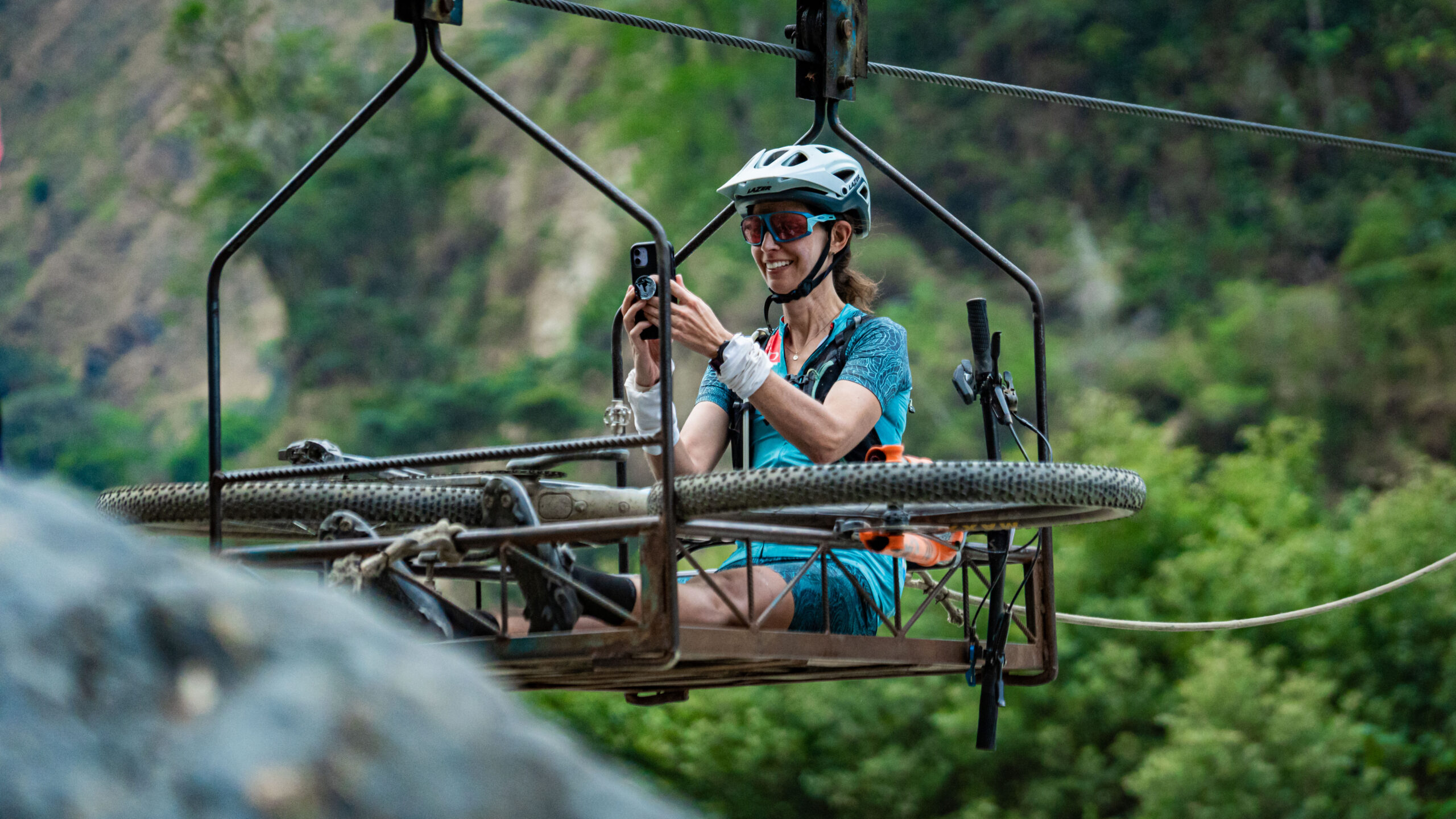 Jen Hanks making to final river crossing by cable cart. Photo courtesy of Machu Picchu Epic